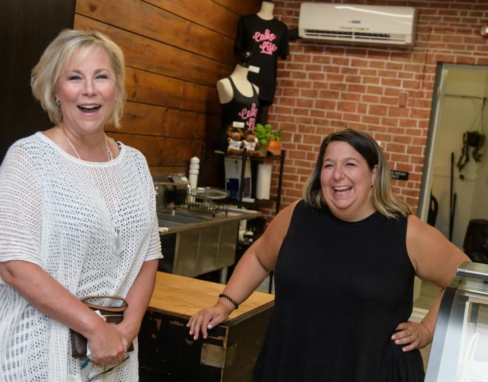 two women near a counter
