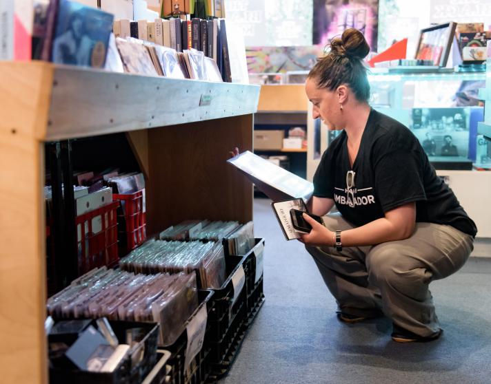 Woman looking at an album